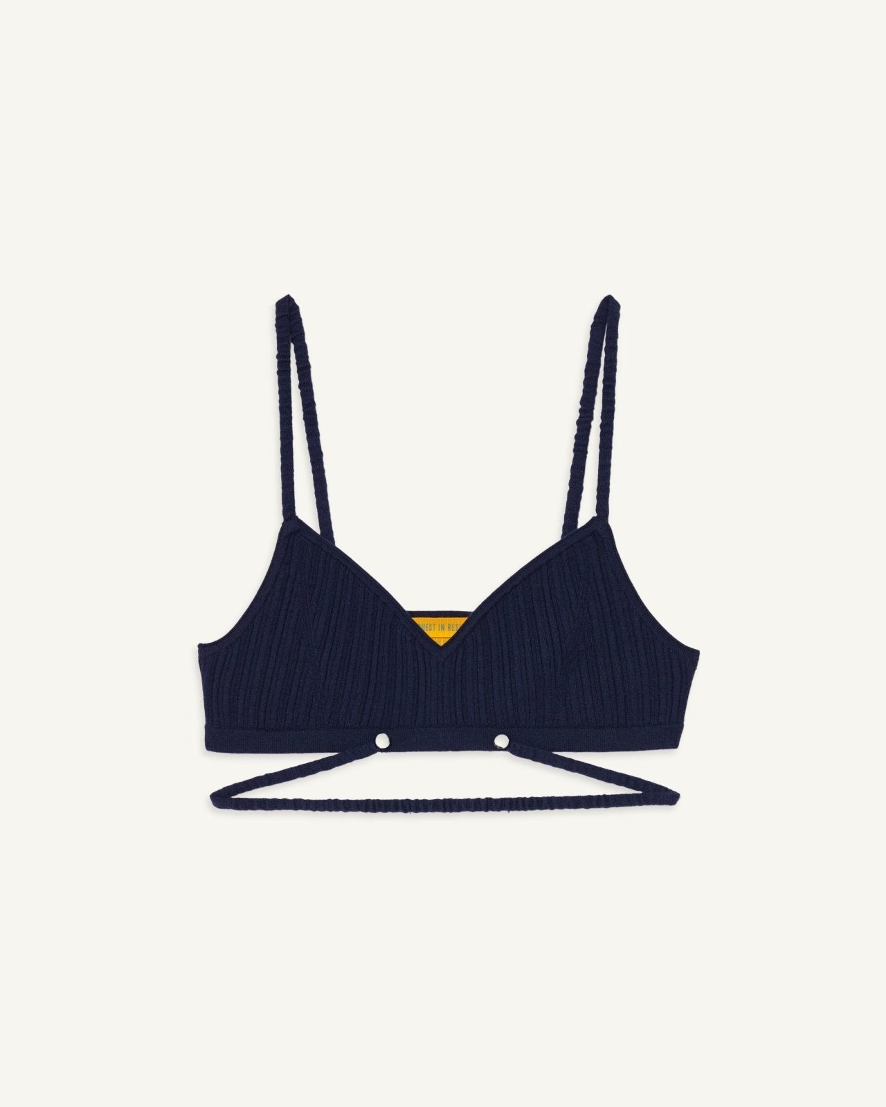 Rib Bra in navy color with adjustable straps and pearlized dome buttons.