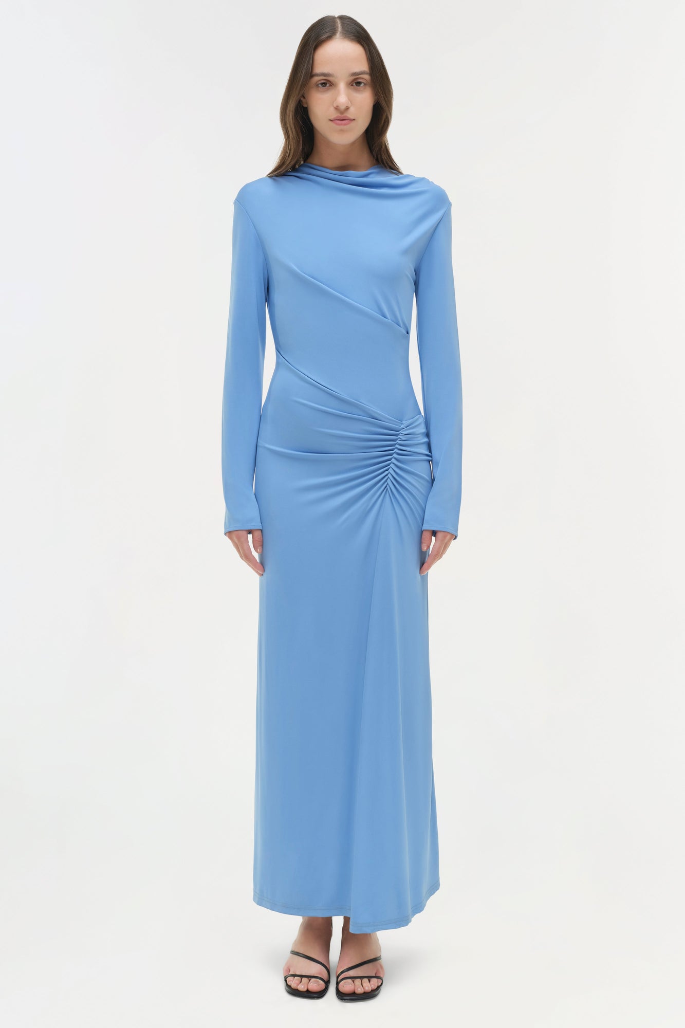 Light blue jersey midi dress with draped ruching detail on the bodice and long sleeves.