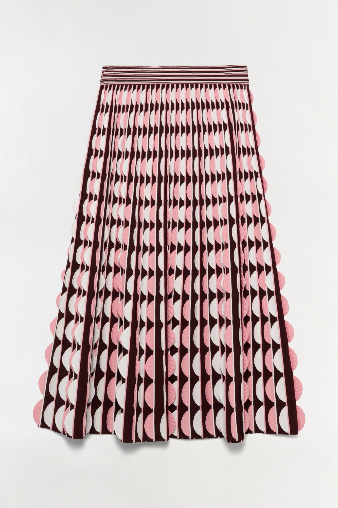 Burgundy and pink knit midi skirt with geometric pattern and scalloped hem detail.