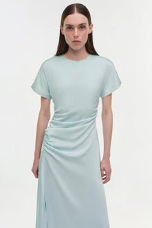 Light blue satin midi dress with short sleeves, ruched side detail, and front slit on model.