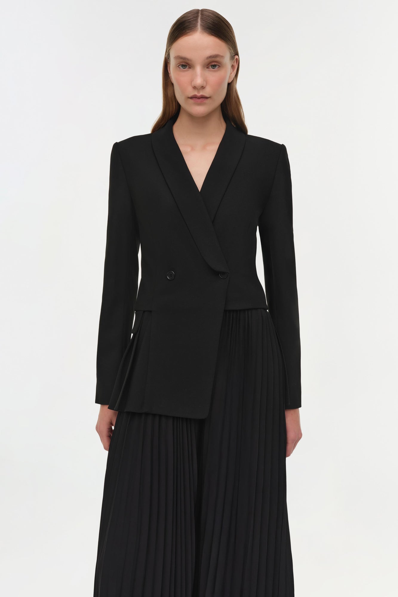 Black blazer midi dress with double-breasted button front and pleated skirt detail.