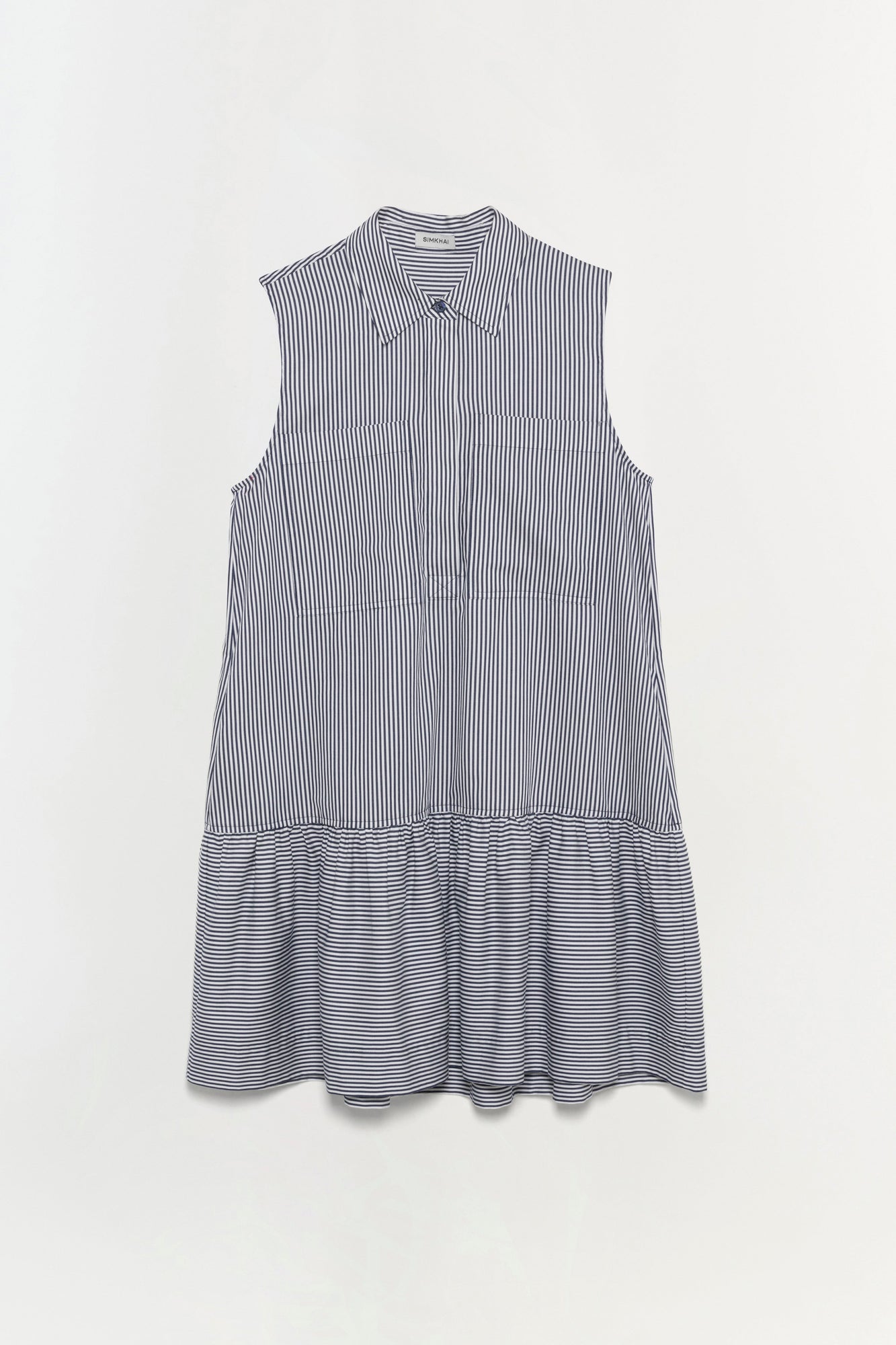 Sleeveless shirt dress with vertical stripes on top and horizontal stripes on bottom in navy and white.