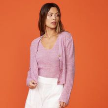 Front view of model wearing the mohair cardigan in raspberry rose.