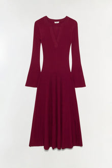 Burgundy ribbed knit midi dress with V-neckline and flared long sleeves.