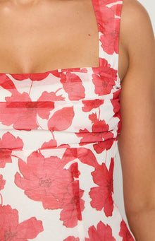 Close-up of the ruched bodice with a square neckline and shoulder strap on the red anemone floral print dress