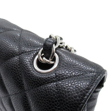 Chanel | Pre-Owned Maxi Classic Caviar Double Flap | Black
