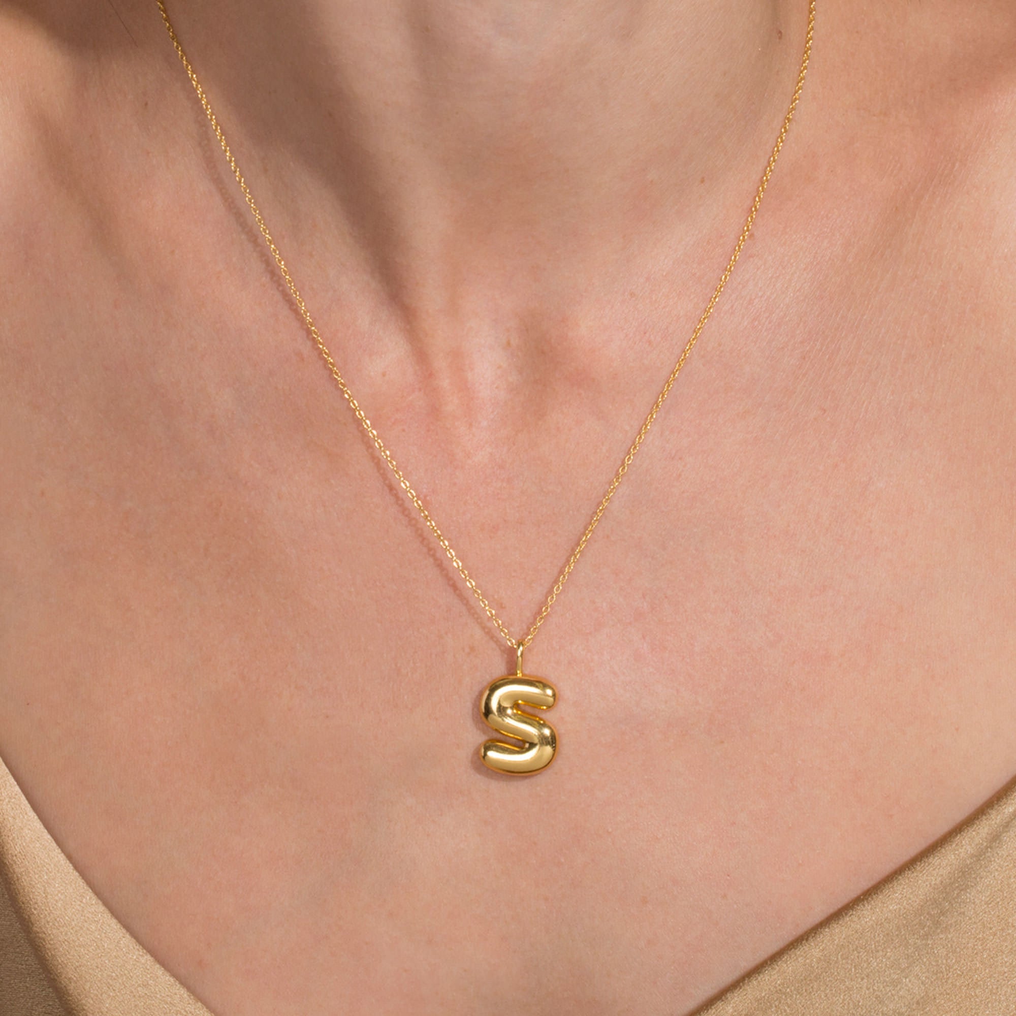 Image of Gold Vermeil XL Bubble Tea Initial Necklace on Models Neck