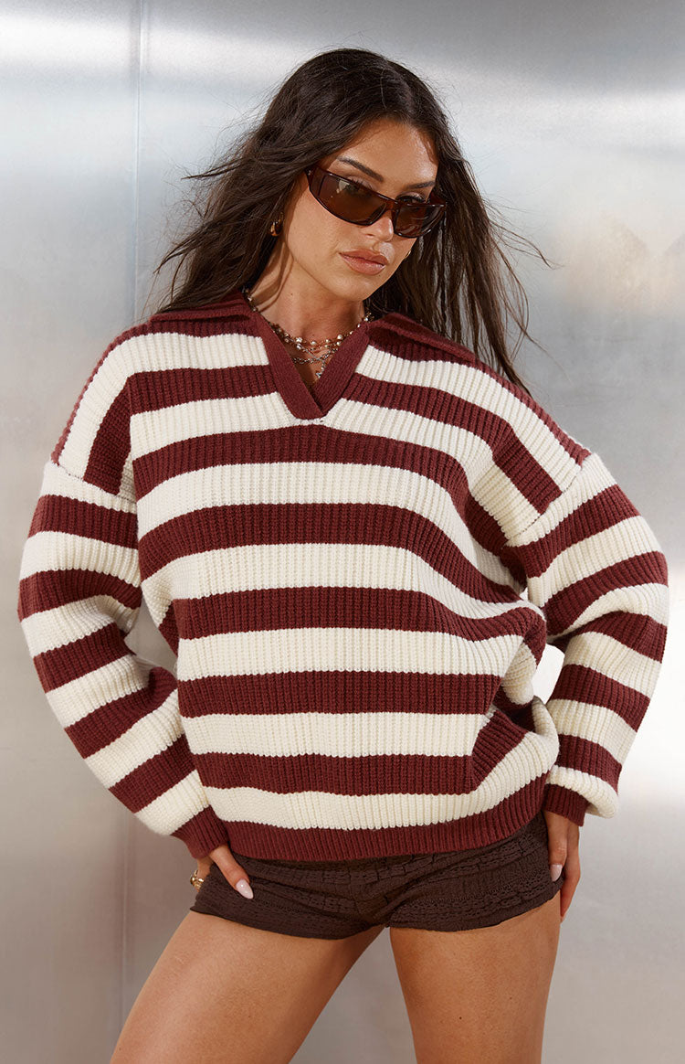 Relaxed fit burgundy and cream striped polo knit sweater with ribbed texture and long sleeves