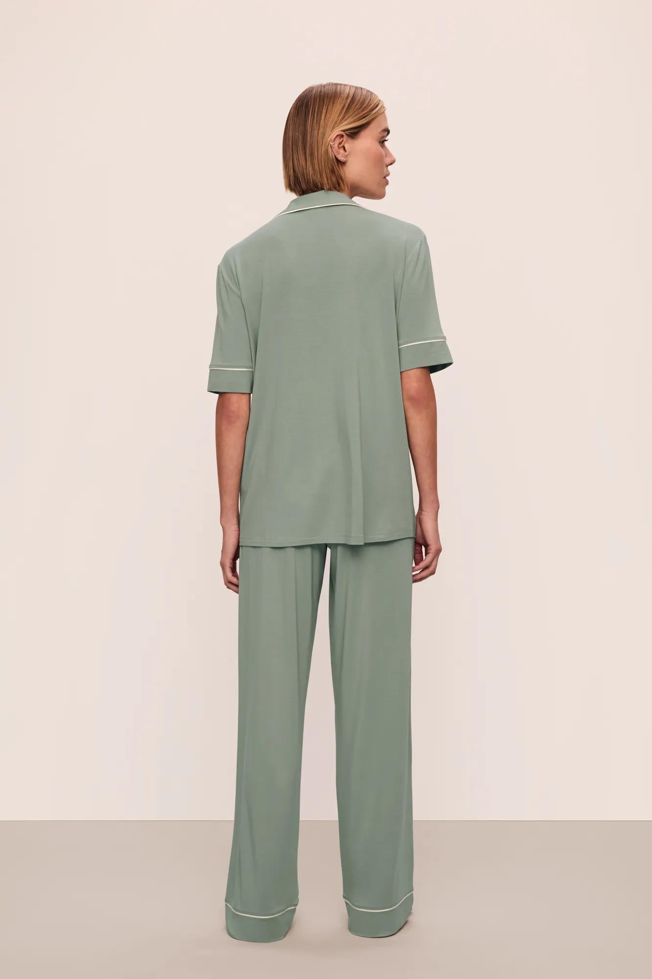 Model is wearing Gisele TENCEL Modal Short Sleeve & Pant PJ Set in Eucalyptus/Ivory