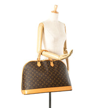 Louis Vuitton | Pre-Owned Monogram Alma Voyage MM | Brown