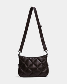 The Rudsak ALICIA - 8323507 Espresso is a black, rectangular quilted purse with diamond-pattern stitching, luxe leather, an adjustable strap, and a minimalist design displayed on a plain white background.