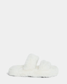 The Rudsak ZETA - 8224508 Iceland is a fluffy white womens faux fur slipper with two thick straps and a cozy design, shown against a plain light gray background.