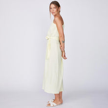 Side View of Model wearing the Gauze One Shoulder Dress in Lemon