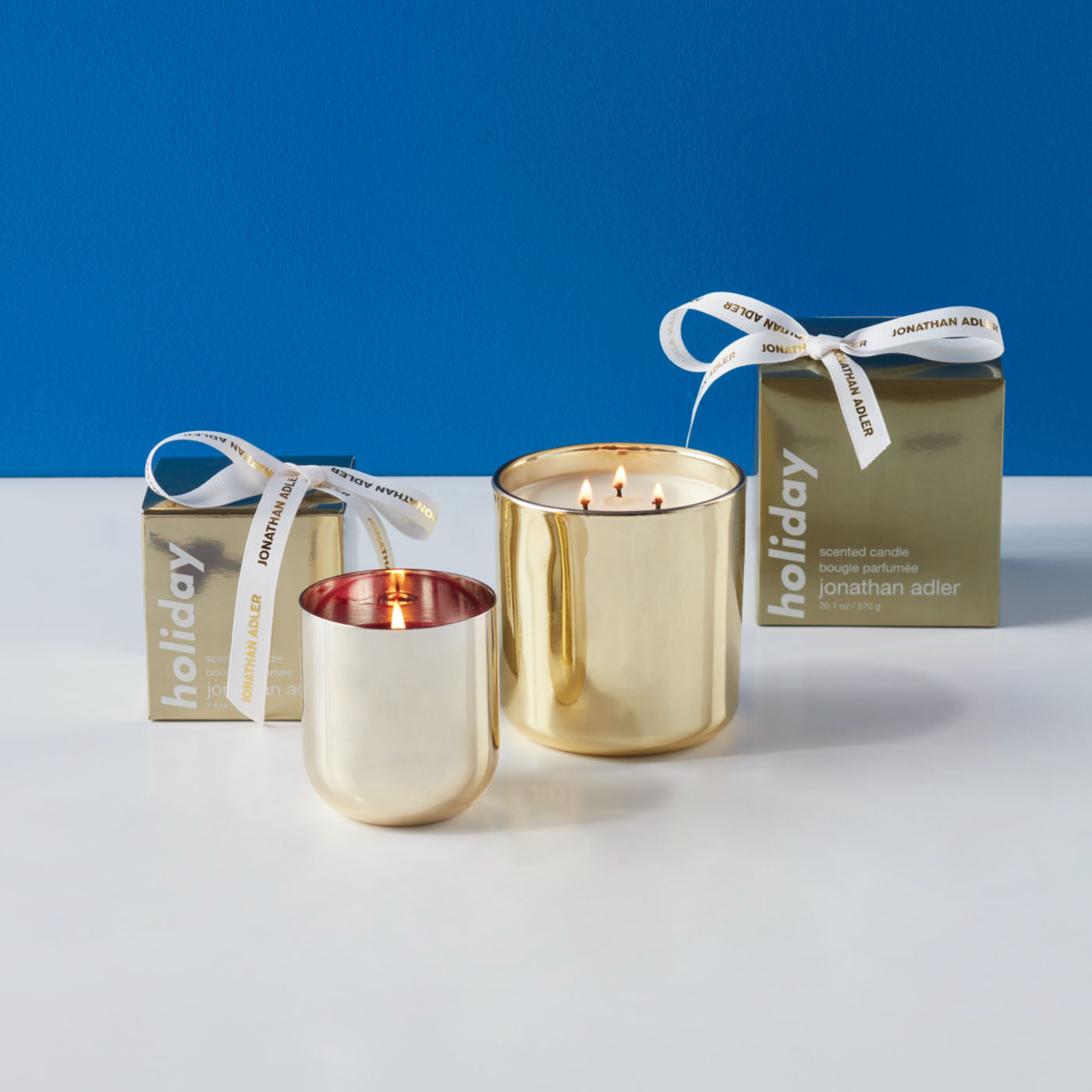 three wick holiday pop candle gold with box - collection view
