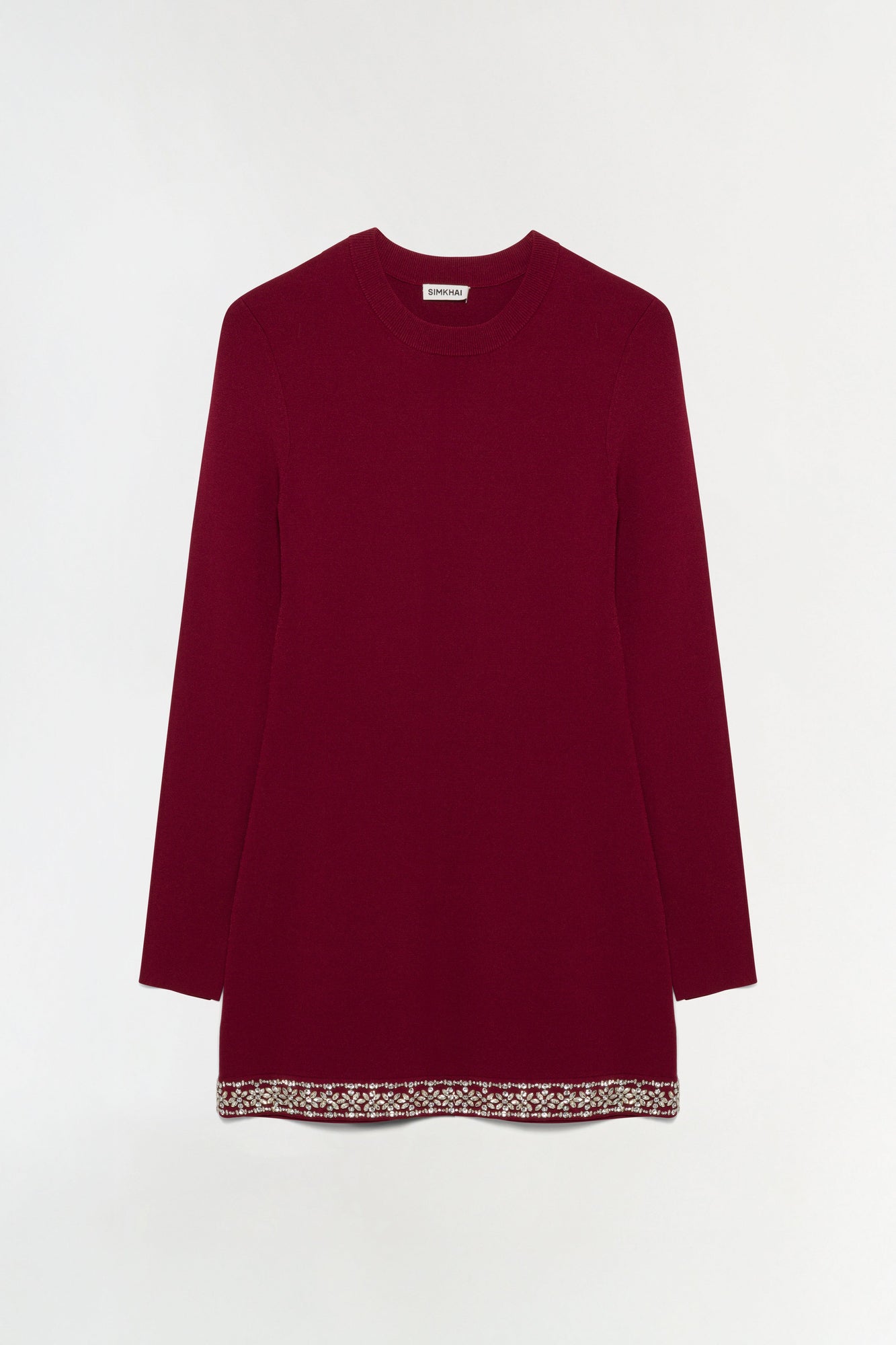 Burgundy knit mini dress with long sleeves and embellished beaded trim at the hem.