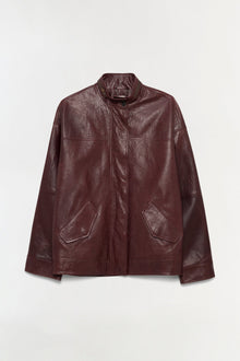 Burgundy leather jacket with stand collar, front zip closure, and patch pockets.