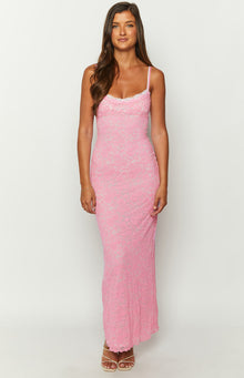 Pink floral lace maxi dress with a white lace trim scoop neckline and thin spaghetti straps
