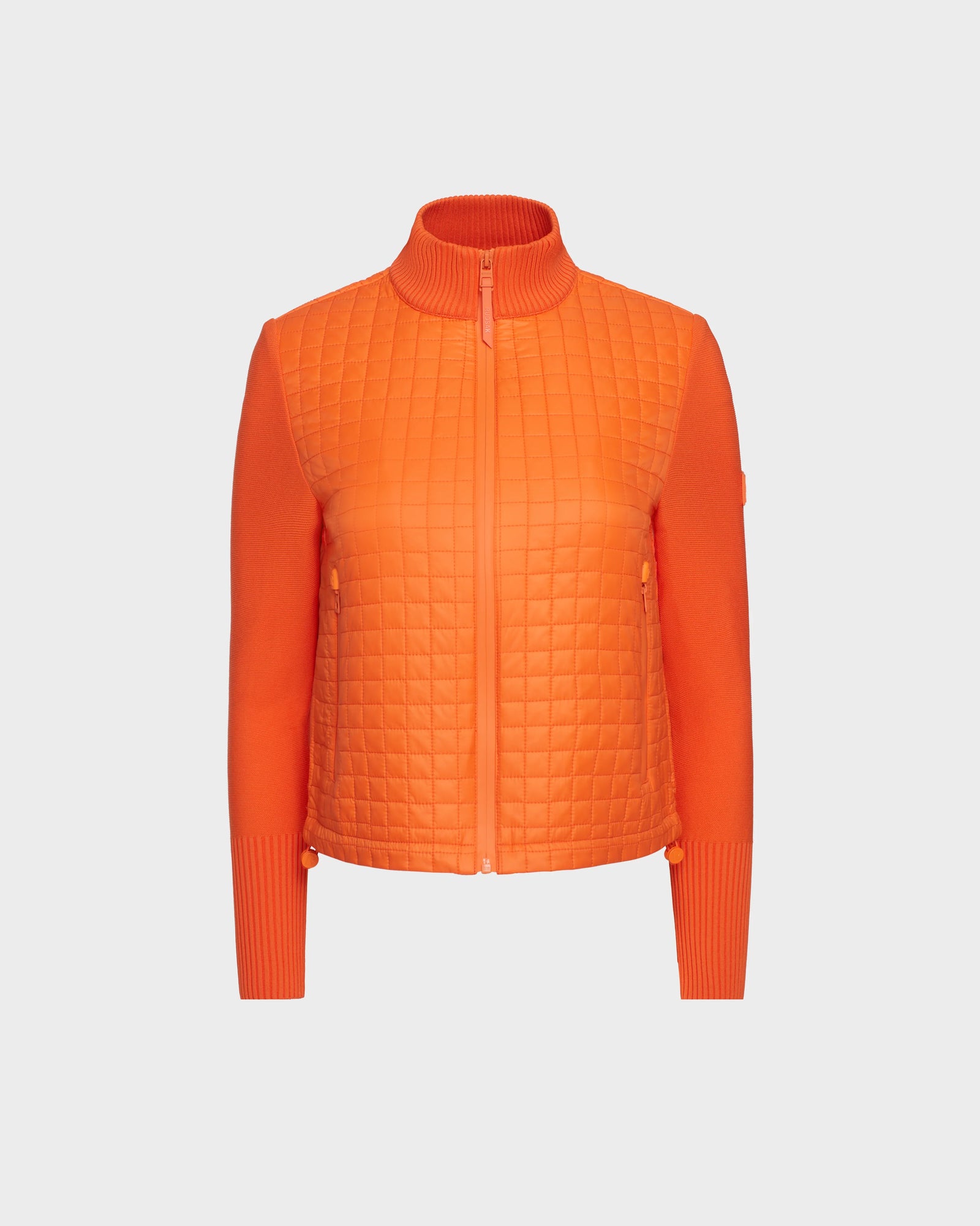 The Rudsak LOUISE - 8124046 in Orange Sorbet is a womens hybrid knit sweater jacket featuring a RDS-certified down quilted front, zip closure, ribbed high collar, long sleeves, fitted silhouette, and modern textured knit details.