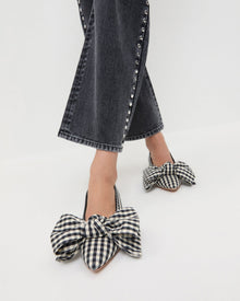 Noa Black/White Gingham Bow Flat in black/white gingham cotton and Winona Denim Pant in washed black denim with silver studs.