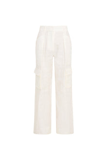 Linen straight leg cargo pants featuring pockets on each leg and on the side, and a center front zipper.