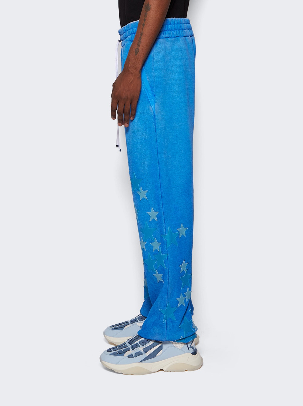 Men | Amiri | Pigment Spray Star Sweatpants | Heather Carolina Blue