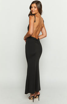 Close-up of the fitted black maxi dress bodice featuring a draped cowl neckline and thin adjustable spaghetti straps