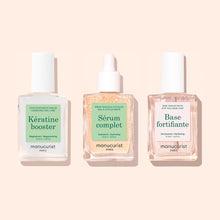 Three square glass bottles from Manucurist’s 