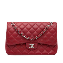 Chanel | Pre-Owned Jumbo Classic Caviar Double Flap - I | Red/Dark Red
