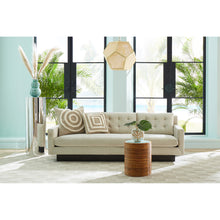 alphaville pedestal wright sofa riviera accent table - styled view