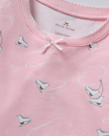 The Kid's Pima Snug Fit Pajama in Winter Skates features a long-sleeved top and pants, displayed flat on a white background.