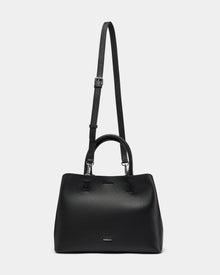 The Rudsak CATIRA S - 8325006 Black is a women’s black pebble leather tote with two short handles, a removable long shoulder strap, minimalist design, and a small silver brand logo on the front.