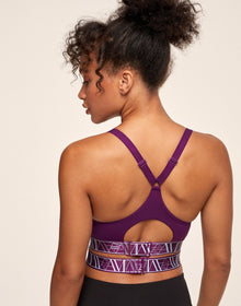 Adore Me Maven Medium-Impact Sports Bra in color Graphic AM Logo C01 and shape sports bra