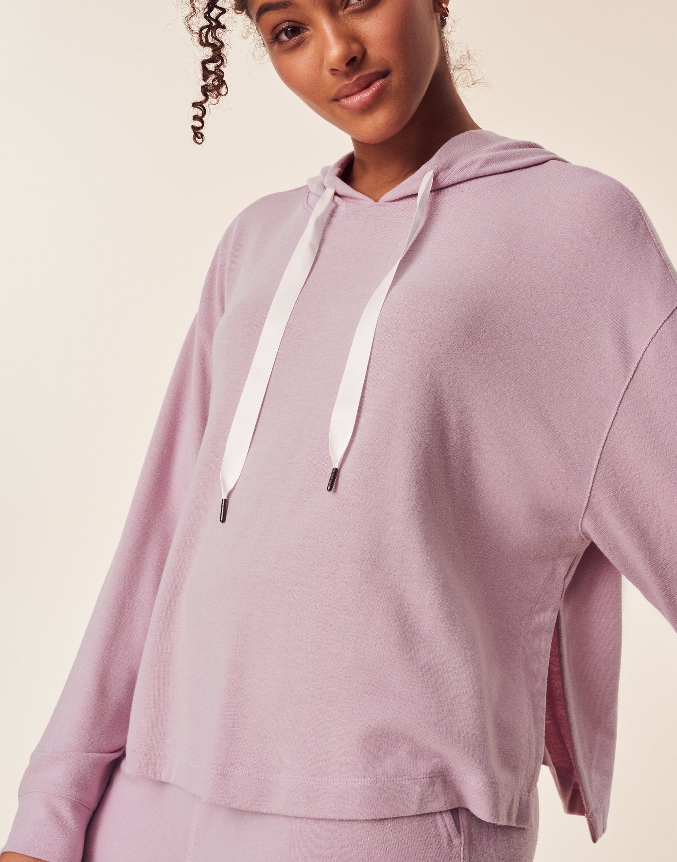 Adore Me Jilianne Cropped Hoodie in color Dawn Pink and shape hoodie