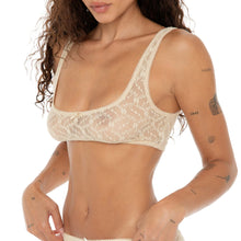 Close-up of the nude Lea Bra showing floral lace detail and small satin bow accent. **nude