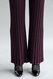 Close-up of Marcelle Trousers in aubergine, highlighting the texture and materials: polyamide, baby alpaca, and silk.